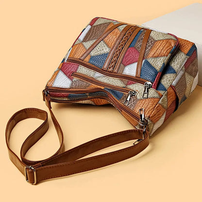 SCARLETT | BOLSO DE MANO CON MOSAICO ATEMPORAL