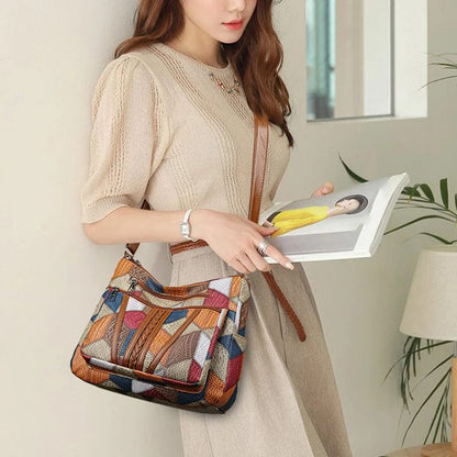 SCARLETT | BOLSO DE MANO CON MOSAICO ATEMPORAL