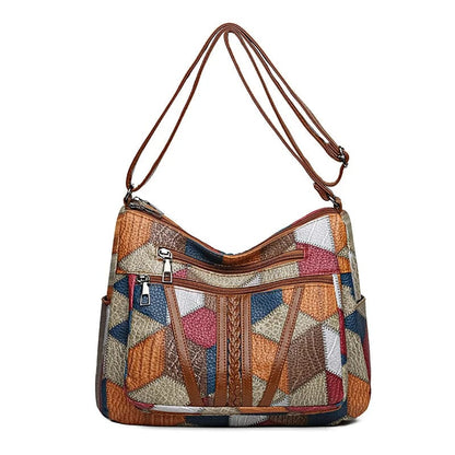 SCARLETT | BOLSO DE MANO CON MOSAICO ATEMPORAL